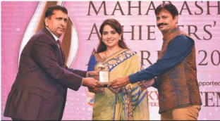 VIP Securities in Mumbai, present the Business innovator Award to Manoj Tirodkar, founder of the Global Group
